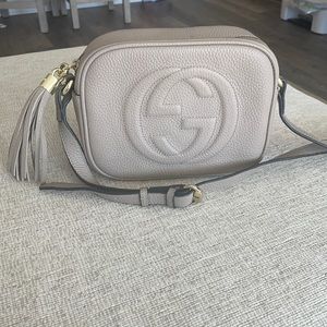 Crossbody camera bag with side tassel